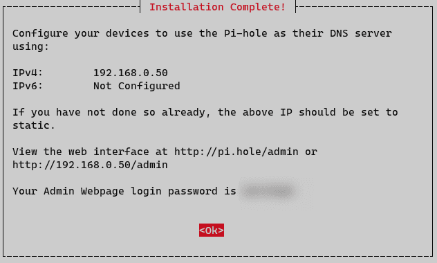 The Pi-hole installer's Installation Complete screen: configure devices to use 192.168.0.50 as their DNS server, view the web interface at http://pi.hole/admin, and the admin password (blurred).